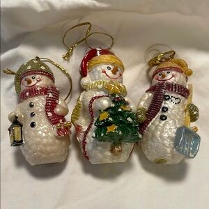 Set of three snowman, snowmen, snowpeople family.